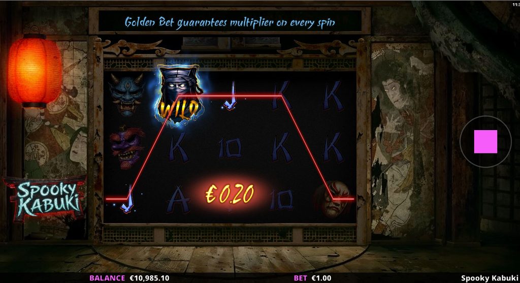 Ecran de câștig la slotul Spooky Kabuki de la Yggdrasil, cu simbol Wild fantomatic, combinație câștigătoare evidențiată pe linie roșie și premiu de 0,20 EUR. Sunt afișate soldul de 10.985,10 EUR, pariul de 1 EUR și mesajul despre funcția Golden Bet, care garantează multiplicatori la fiecare rotire.